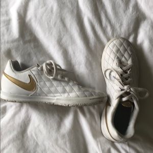 Kids size 3.5 white with gold Nike Tiempo shoes